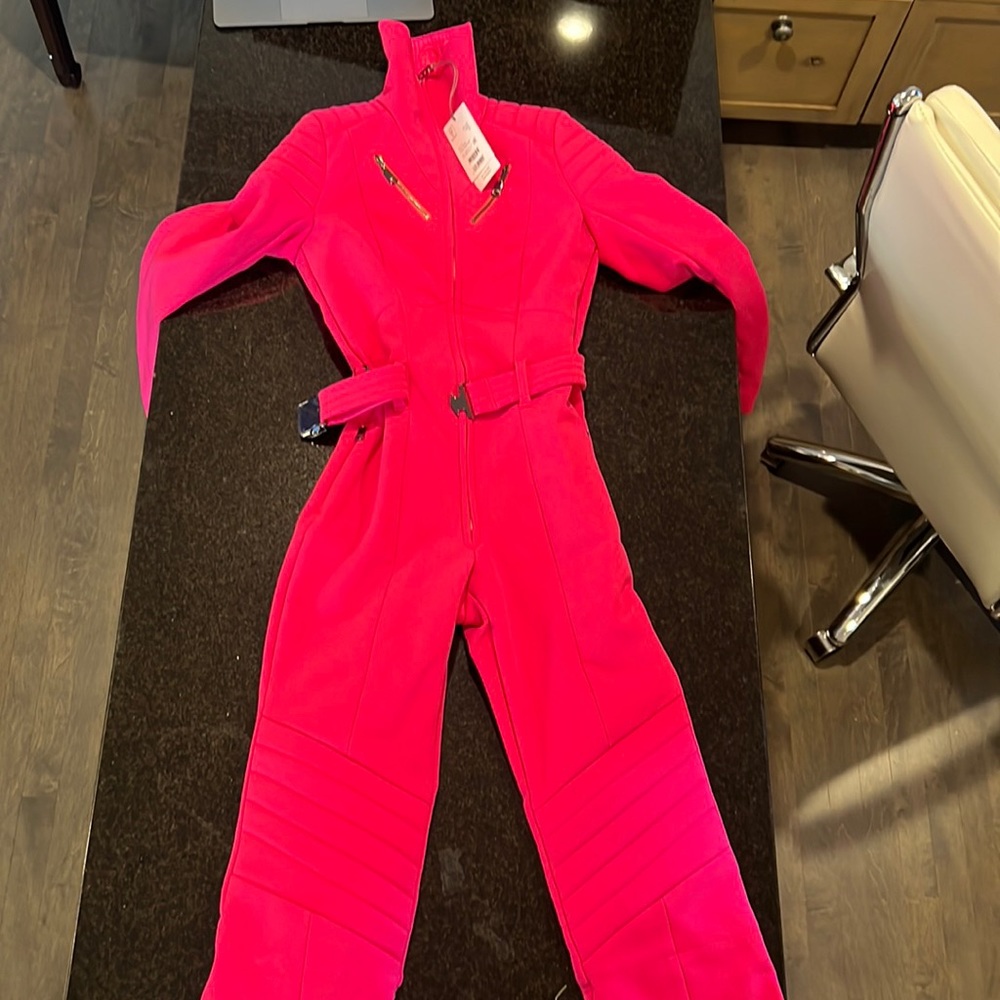 Brand new womens all in one soft shell ski suit.  Retail $2000